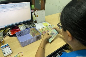 Thưởng Tết cho người lao động sẽ do người sử dụng lao động quyết định. Ảnh: TRẦN MINH