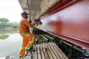 Cấm toàn bộ xe qua cầu Phú Định quận 6 để mở rộng cầu