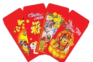 Tiền lì xì như là lời chúc tốt lành trong năm mới... Ảnh minh họa: Nguồn: Internet