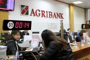 Agribank quyết tâm cùng ngành ngân hàng xử lý nợ xấu