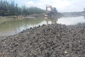 Tháo gỡ “rào cản” để xử lý tro xỉ nhiệt điện