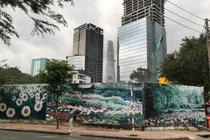 Cao ốc 'đất vàng' làm xấu mặt TP.HCM bị cắt ngọn