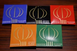 Olympic Bắc Kinh: Hạn chế ôm hôn nhưng vẫn phát bao cao su cho vận động viên