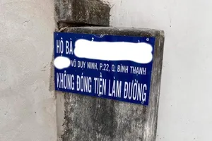 Bị bêu tên vì chưa đóng tiền để nâng cấp hẻm