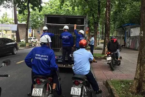 Đội bắt chó quận 1, TP.HCM trong một lần ra quân bắt chó thả rông vào năm 2018. Ảnh: HT