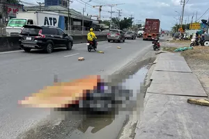 Tự té ngã trên Quốc lộ 1, cô gái 25 tuổi va chạm xe container tử vong