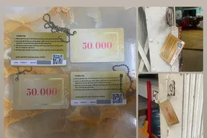 Công an khuyến cáo cảnh giác thẻ lạ chứa mã QR treo trên xe, cửa nhà