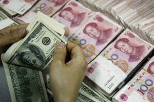 Đồng nhân dân tệ giảm giá sẽ tổn thương châu Á