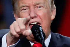 Ông Trump thách thức ‘nút hạt nhân’ của ông Kim Jong-un