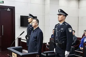 Ông Mạnh Hoành Vĩ bị tuyên án 13 năm rưỡi tù ngày 21-1. Ảnh: AFP