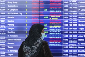 Malaysia cấm du khách nhập cảnh, cấm công dân ra nước ngoài. Ảnh: EPA