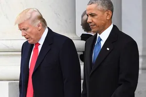 Ông Trump và ông Obama tại tòa nhà Quốc hội Mỹ ngày 20-1-2017. Ảnh: GETTY IMAGES