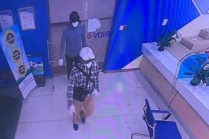 Công bố hình ảnh 2 nghi phạm nổ súng cướp ngân hàng BIDV
