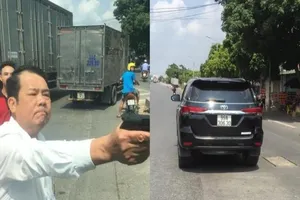 1 giám đốc chĩa súng dọa bắn vì mâu thuẫn giao thông