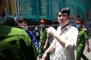 Giữ 1 tờ tiền giả làm kỷ niệm, thanh niên bị thêm tội