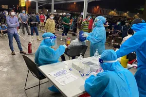 Cả nhà người bán thịt heo chợ Bình Điền test nhanh dương tính 