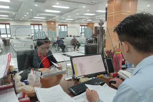 Lương cơ sở tăng, người đã mua BHYT có phải đóng thêm tiền?