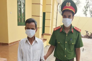 Võ Tiến Trung bị bắt giữ. Ảnh: QM