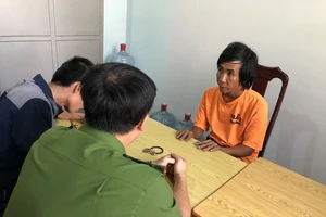 Nguyễn Văn Công tại cơ quan điều tra. Ảnh: QM