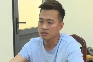 Đạt tại cơ quan điều tra. Ảnh: AĐ