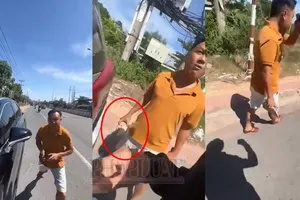 Cán bộ Cảnh sát giao thông cầm đá định đánh người, sẽ chuyển đơn vị khác