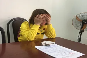 Bà CTNH tại cơ quan chức năng. Ảnh Hải Dương