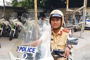 Đại uý Nguyễn Hữu Thắng lúc còn làm ở Đội CSGT Tuần tra - Dẫn đoàn, PC08 Công an TP.HCM. Ảnh: HOÀNG KIM