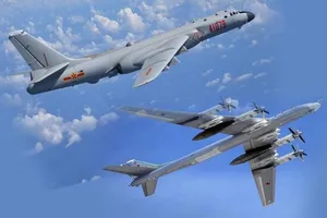 Nhật, Hàn Quốc điều máy bay áp sát máy bay Nga, Trung Quốc tập trận khi nhóm Bộ tứ đang họp