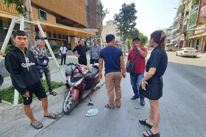 Truy xét hai thanh niên đi xe Exciter màu đen giật túi xách ở quận 6