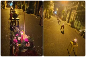 Bà giáo lặng thầm và dãy hàng hoa lung linh trong đêm tưởng niệm 