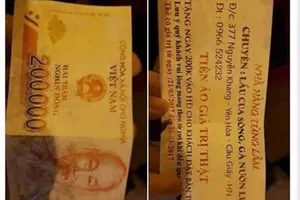Nhà hàng in 'tiền ảo giá trị thật' hủy khuyến mãi