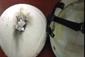 Bắt kẻ ngụy trang ma túy trong mũ bảo hiểm