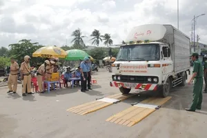 Thuê xã hội đen gây sức ép trạm cân