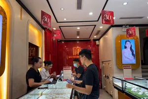 Giá vàng thế giới giảm sau tuyên bố chính sách của Fed 