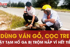 Quảng Trị: Dùng ván gỗ, cọc tre đậy tạm hố ga bị trộm nắp vì…hết tiền