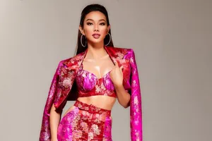 Thùy Tiên chọn thiết kế hồng gấm nổi bật khi tham gia phỏng vấn kín tại MGI