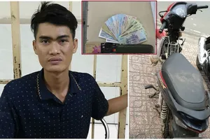 1 phụ nữ giật lại chiếc bóp trên tay kẻ cướp giật ở quận 1