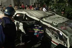 Taxi bị tông văng nhiều vòng, nữ hành khách tử nạn