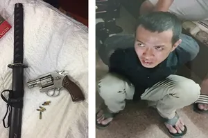 Ông trùm ma túy quận 7 thủ súng rulô đạn đã lên nòng