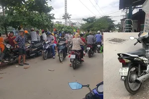 Người phụ nữ ngồi uống nước chờ tàu hỏa tới để tự tử