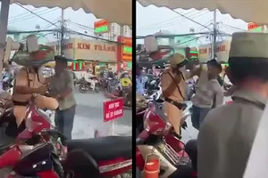 2 thanh niên nhậu say, đánh CSGT ngay giữa ban ngày