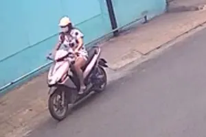 Hình xăm tố cô gái cướp giật ở quận Tân Phú