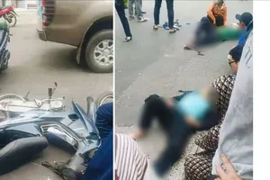 Ô tô tông 2 xe máy dừng đèn đỏ ở Tân Bình