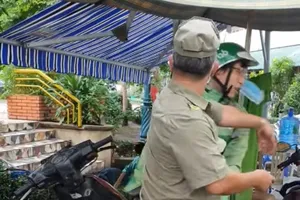 Đình chỉ 2 bảo vệ dân phố tát tài xế Grab ở Bình Thạnh