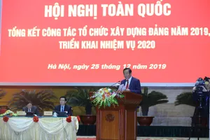 Phó trưởng ban Tổ chức Trung ương Lê Thanh Bình trình bày báo cáo. Ảnh: N.Y