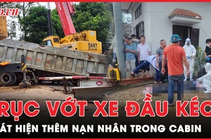 Bàng hoàng phát hiện nạn nhân trong cabin sau khi trục vớt xe đầu kéo dưới cầu Phong Châu