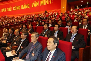 Đại biểu dự phiên thảo luận các văn kiện đại hội tại hội trường, sáng 28-1. Ảnh: TTXVN