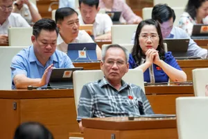 Quốc hội bàn việc thay lương cơ sở bằng mức tham chiếu để đóng BHXH