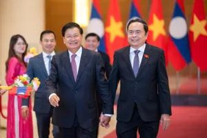 Vun đắp mối quan hệ Việt Nam - Lào mãi mãi vững bền hơn núi, hơn sông