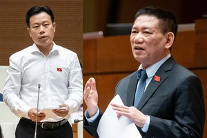 ĐBQH Lê Quân (đoàn Hà Nội) và Phó Thủ tướng, Bộ trưởng Bộ Tài chính Hồ Đức Phớc (bên phải) tại phiên thảo luận ngày 5-11.